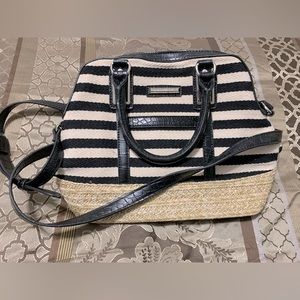 Dana Buchman medium size purse. Includes shoulder strap.